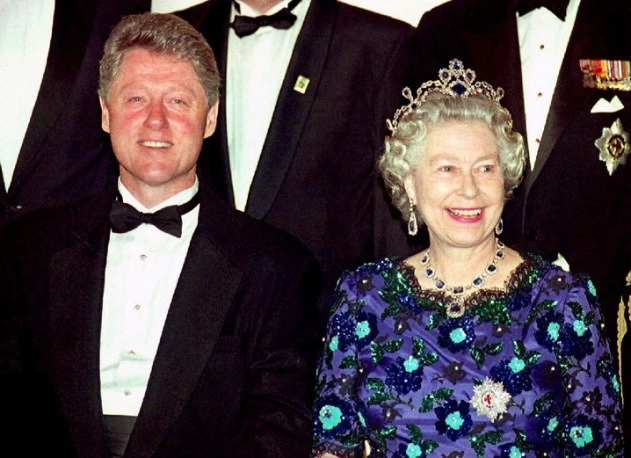 Christians Queen Elizabeth with paedophile serial sex attacker ex President Bill Clinton