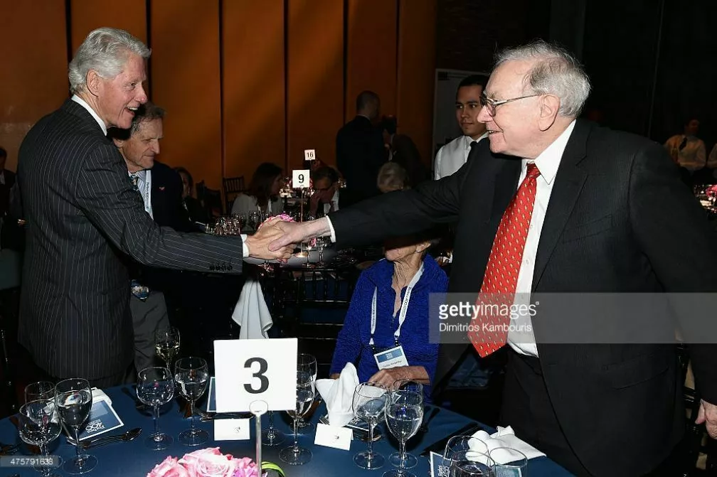 Paedophile serial sex attacker ex President Bill Clinton with alleged child killer Warren Buffett