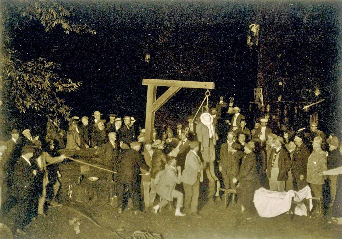 A little black boy being hanged at Bohemian Grove where Prince Philip & George Bush Sr/Jr attended