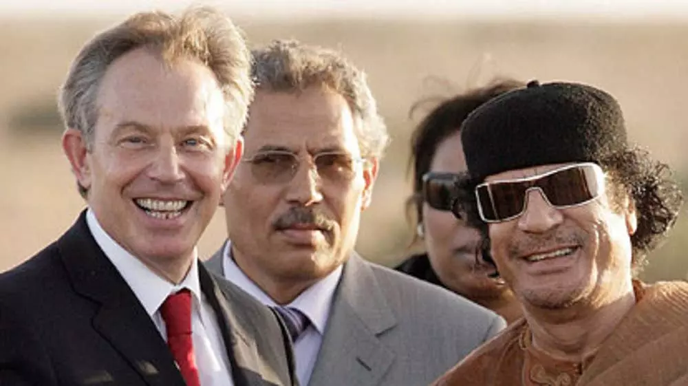Paedophiles Roman Catholic Ex PM Tony Blair with Muammar Gaddafi who raped children