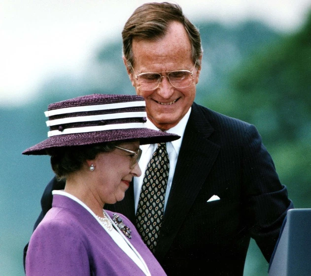 Christians Queen Elizabeth with relative Skull & Bones paedophile President George Bush Sr