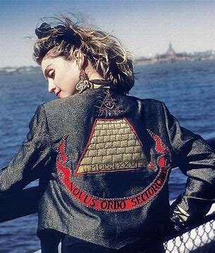 Paedophile Madonna with the Freemason pyramid and all seeing eye