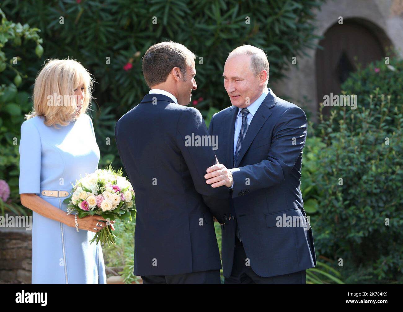 Alleged paedophile Vladimir Putin with child molester Brigitte Macron