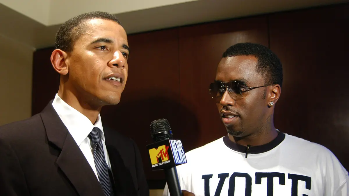 Barry Soetoro with paedophile P Diddy - Obama was allegedly involved in child porn blackmail
