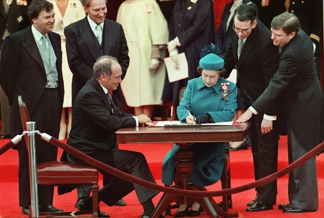 Paedophile child killer Pierre Trudeau with Queen Elizabeth II