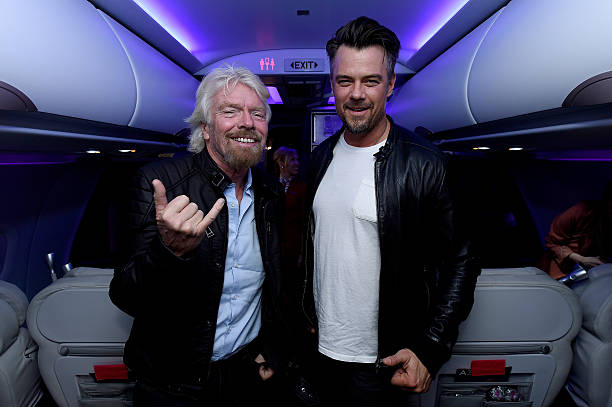 Paedophile Richard Branson & Devil Horns Hand Signs