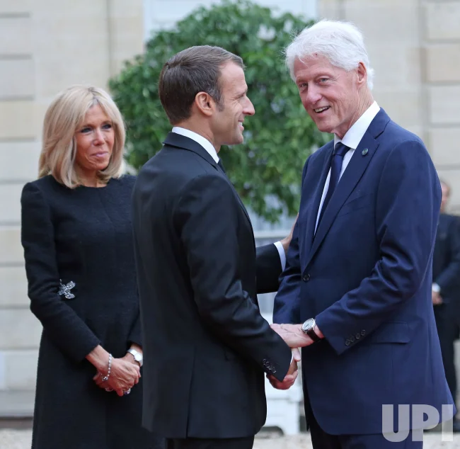 Paedophile Bill Clinton with child molester Brigitte Macron